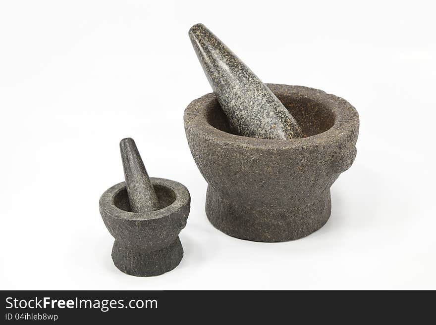 Two sizes of mortar and pestle