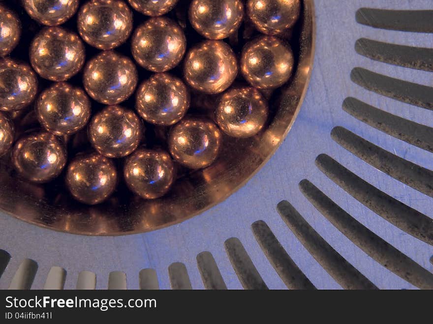 Little golden Metallic Magnetic balls in radiator. Little golden Metallic Magnetic balls in radiator