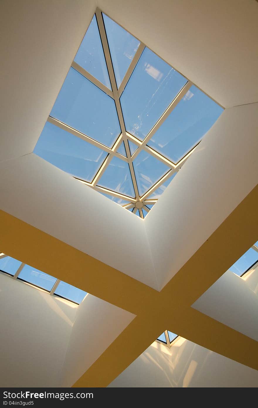 Detail of a hotel roof and window, forming the letter X. Detail of a hotel roof and window, forming the letter X.