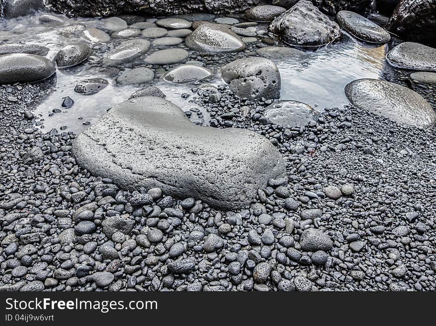 Close up of pebble stones on a beach. Close up of pebble stones on a beach.