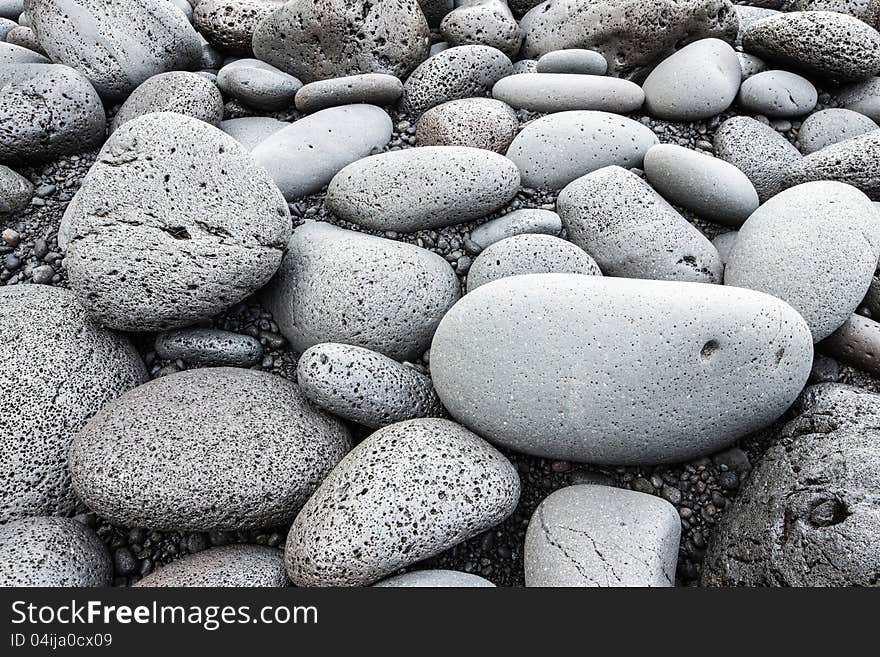 Big pebbles background, shot on a beach in Iceland.