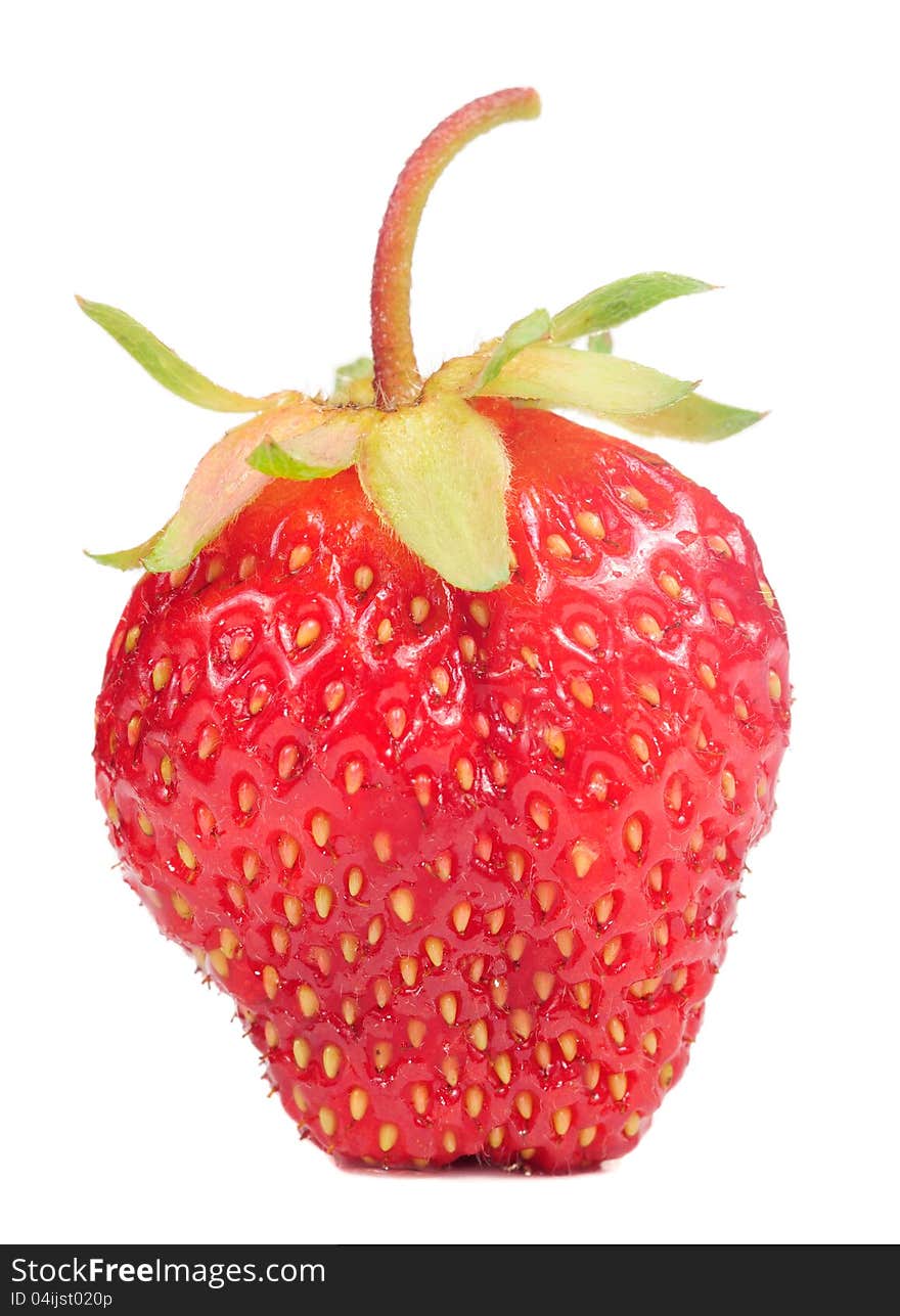 A juicy red strawberry isolated on a white background