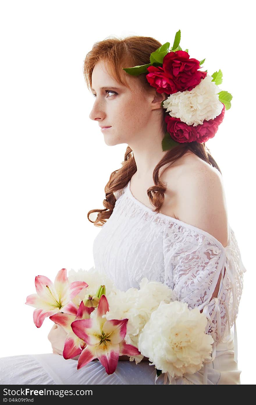 Portrait of a red-haired woman with flowers