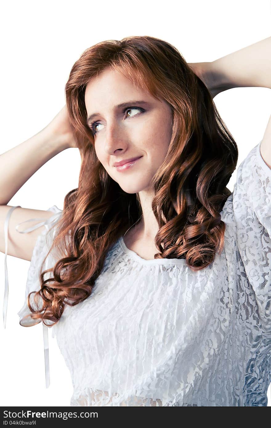 Portrait of red-haired girl on white background