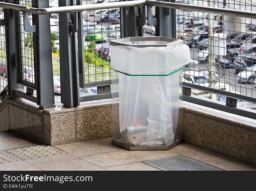 Trash can or garbage bin made of transparency plastic, used in city or crowded area for safety purpose. Trash can or garbage bin made of transparency plastic, used in city or crowded area for safety purpose