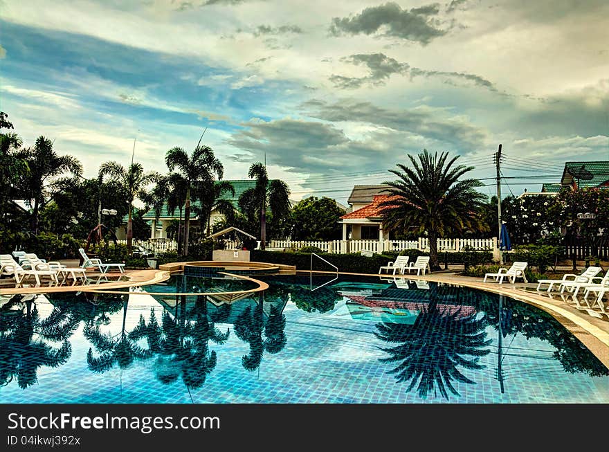 Beautiful sky before a sunset over the pool in Thailand. Beautiful sky before a sunset over the pool in Thailand