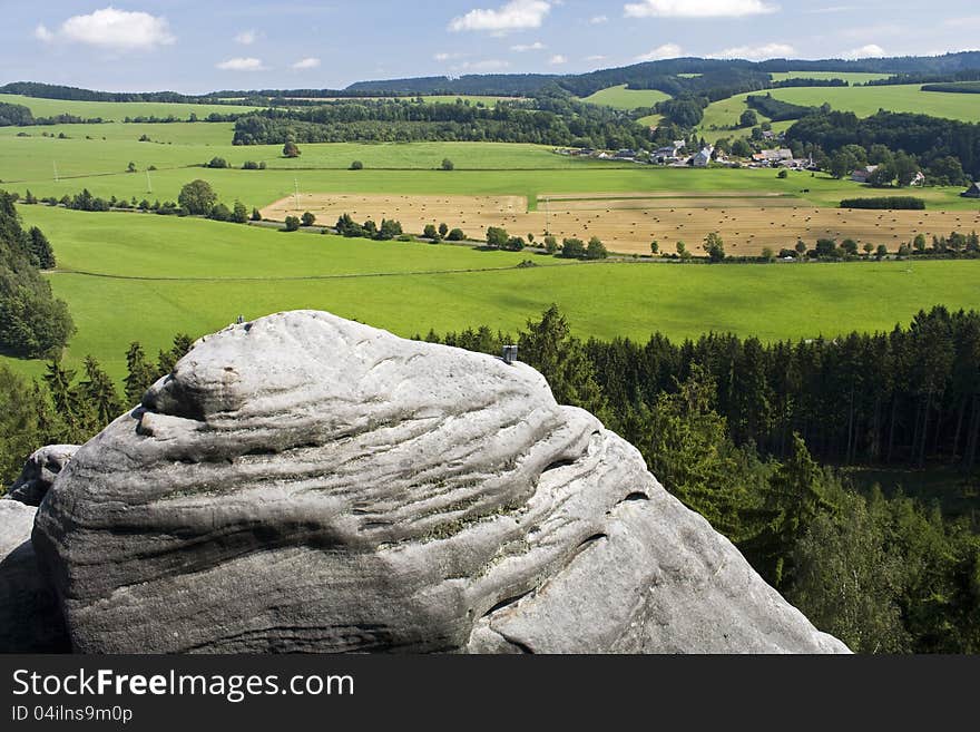 View of rocks on summer agricultural landscape. View of rocks on summer agricultural landscape