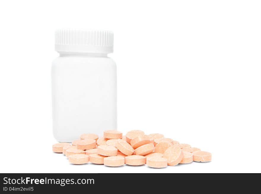 The picture of a bottle and vitamins on white background