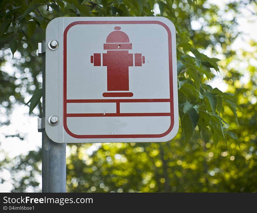 Steet sign saying the position of a fire hydrant