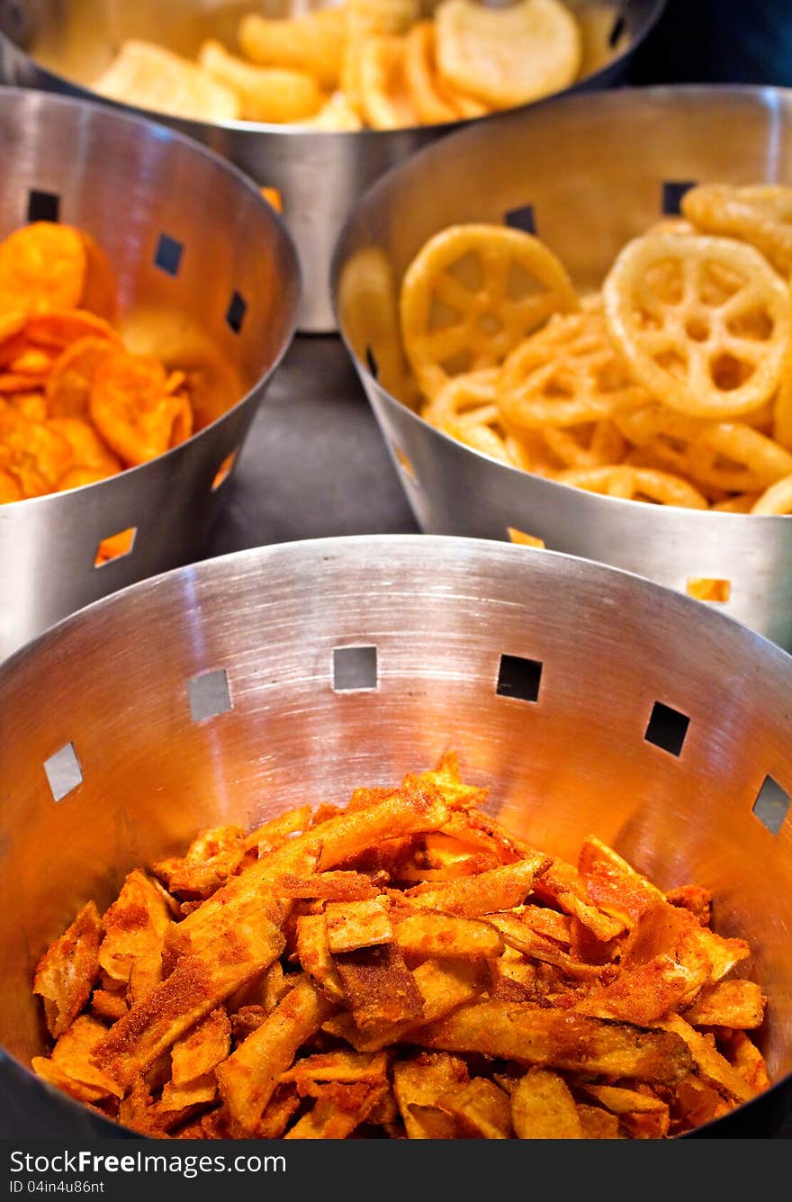 Delicious fast food fried potato & banana crisps