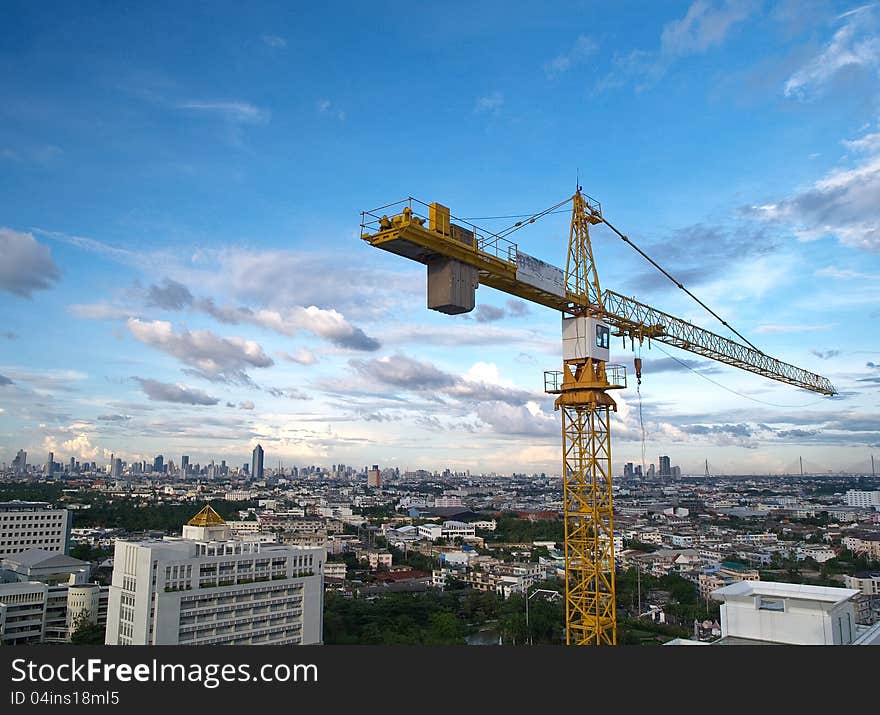 Tower crane on blue sky background