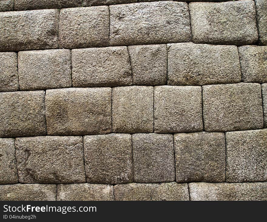 Detail of Inca wall in the ancient city of Machu Picchu, Peru