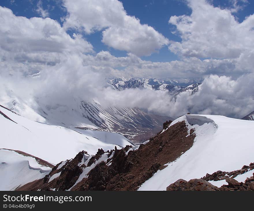 Mountain Valley shot from above the clouds Tien Shan