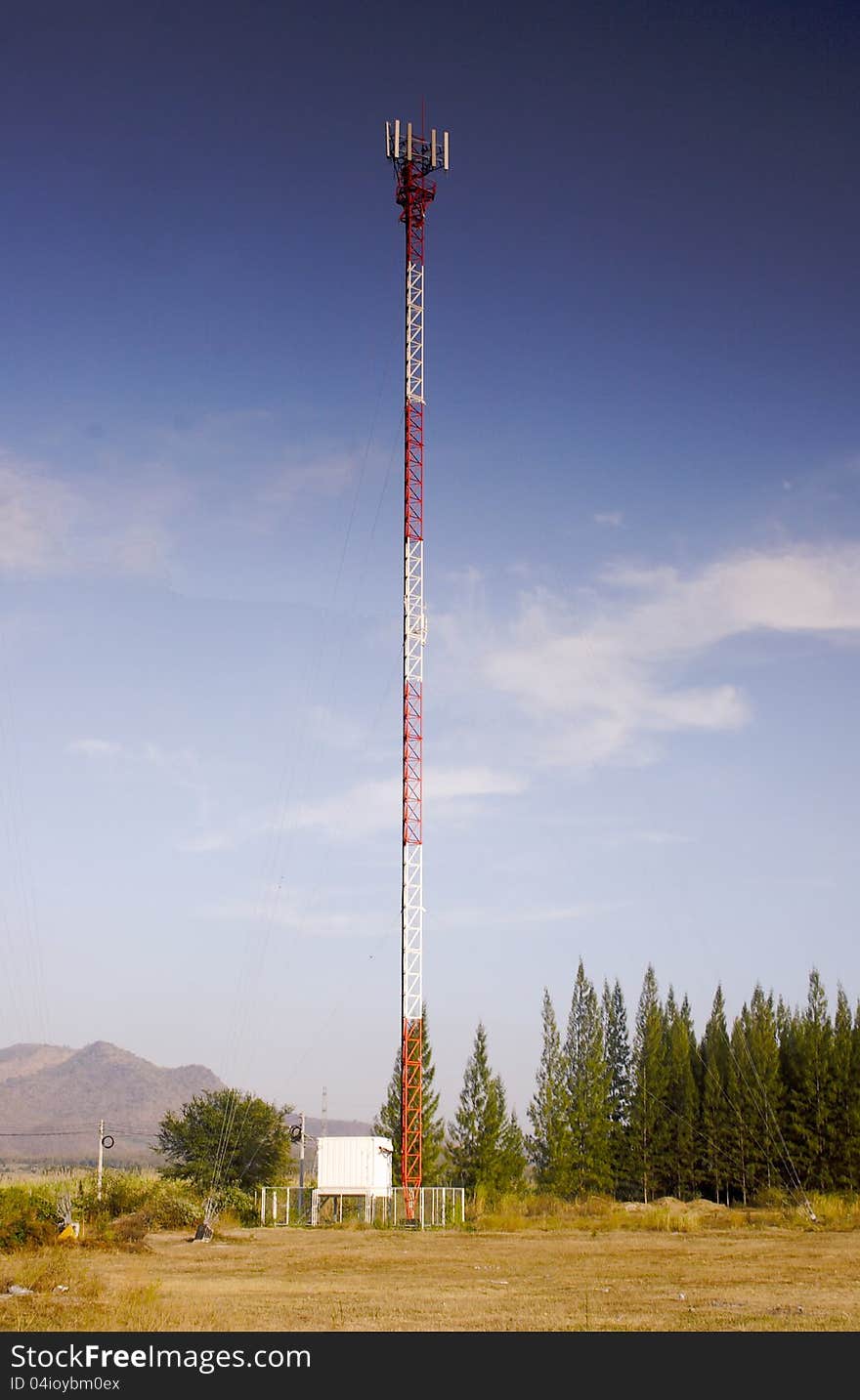 Mobile phone communication antenna tower sky blue