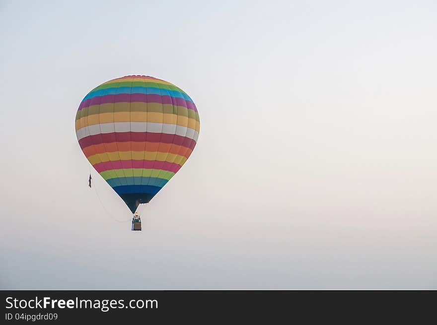 Colorful Hot Air Balloon in Early Morning Flight a