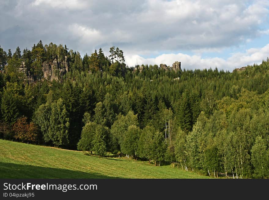 Rock formations in the green forest. Rock formations in the green forest