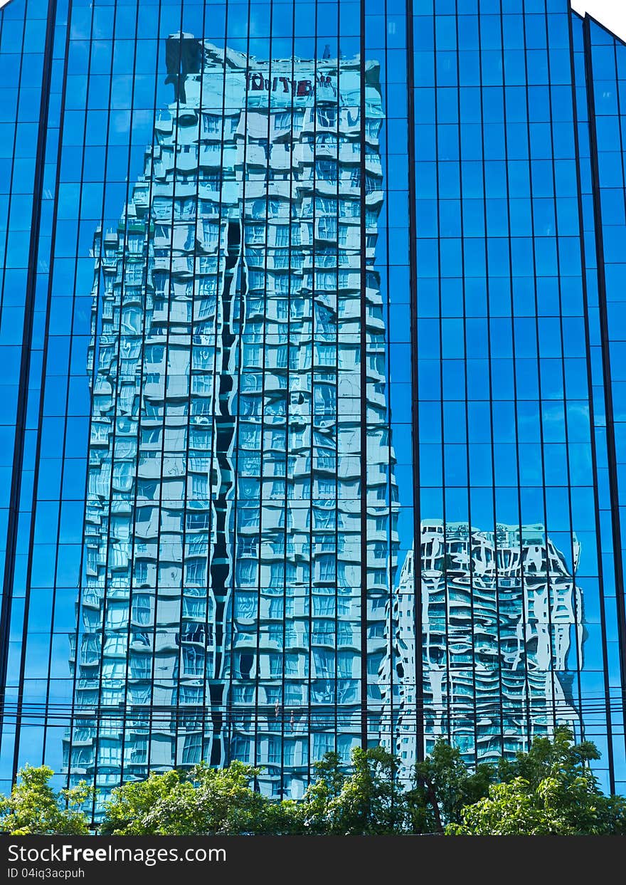 Reflection of buildings in the building, Bangkok