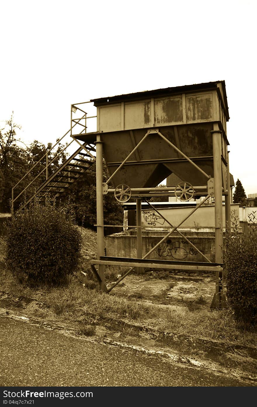 Old metal hopper with iron stairs. Old metal hopper with iron stairs