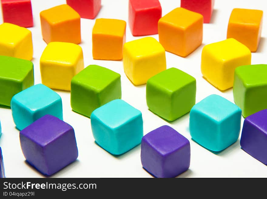 Colorful cubes with paste on isolated background