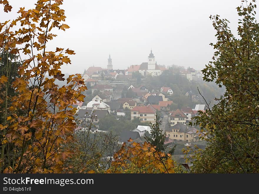 Czech town among the trees in the fog. Czech town among the trees in the fog