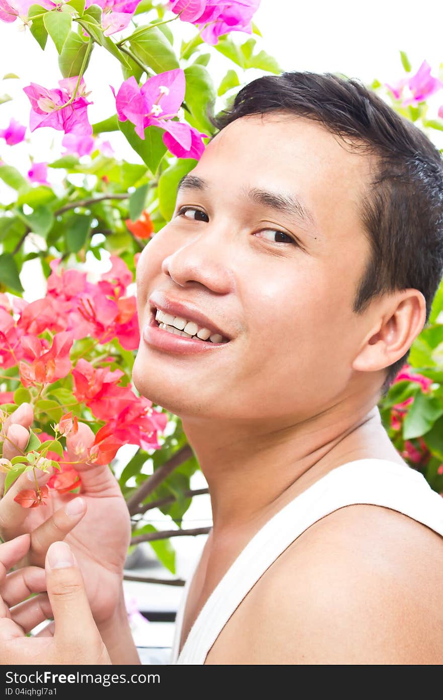 Asian Man Enjoying in Garden. Asian Man Enjoying in Garden