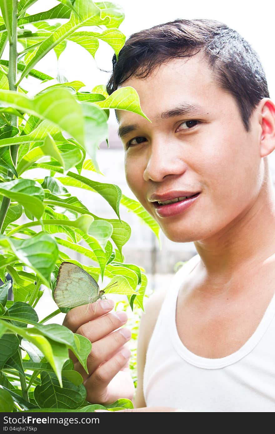 Asian Man Enjoying in Garden. Asian Man Enjoying in Garden