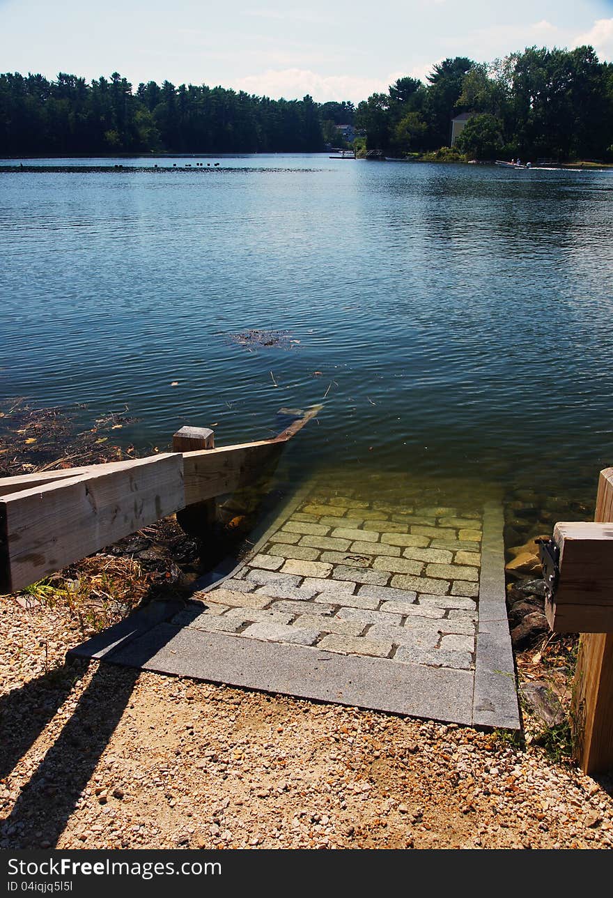 A small boat ramp in the river