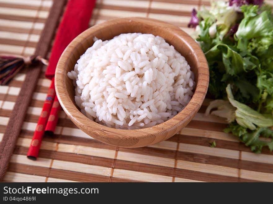 Rice In Bowl With Chopsticks