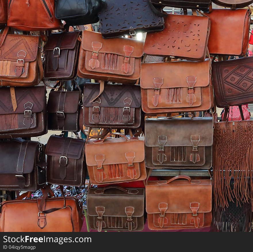 A number of bags on a market stall