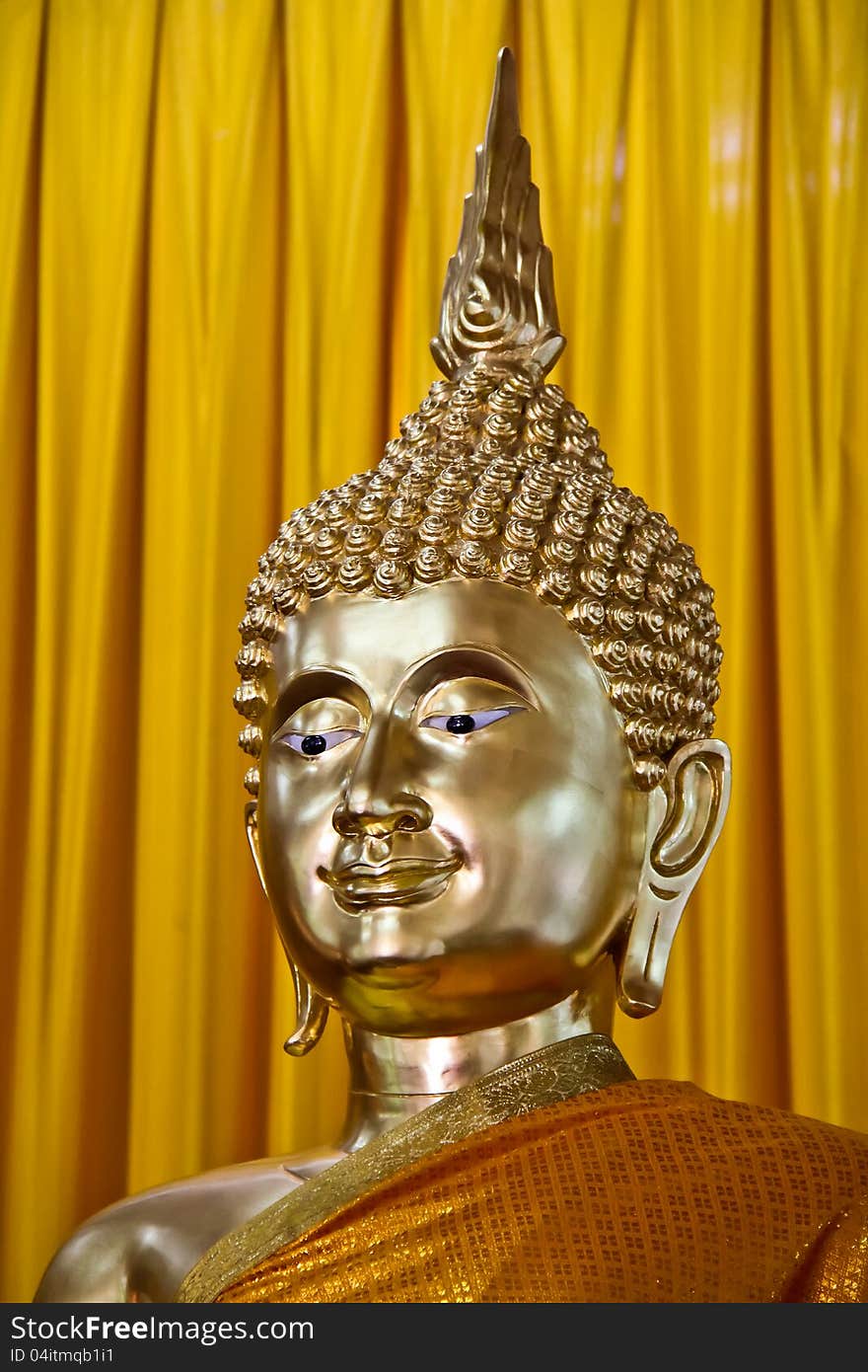 Golden Buddha image with smiling face, Bangkok, Thailand. Golden Buddha image with smiling face, Bangkok, Thailand