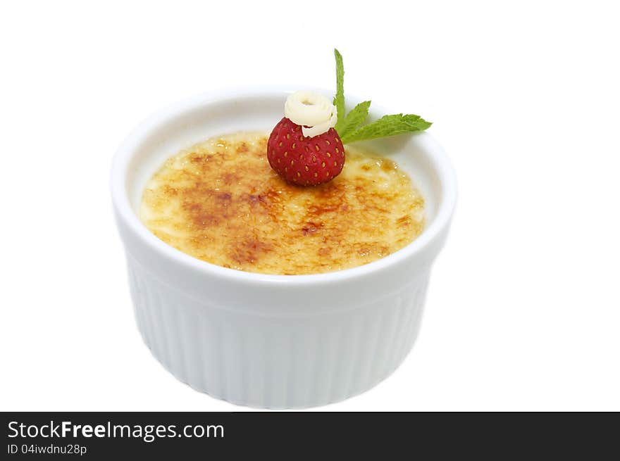 Portion of the cream brulee on a white background. Portion of the cream brulee on a white background