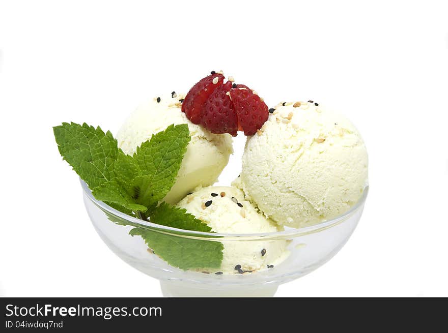 Ice cream with caramel sauce and mint on a white background. Ice cream with caramel sauce and mint on a white background