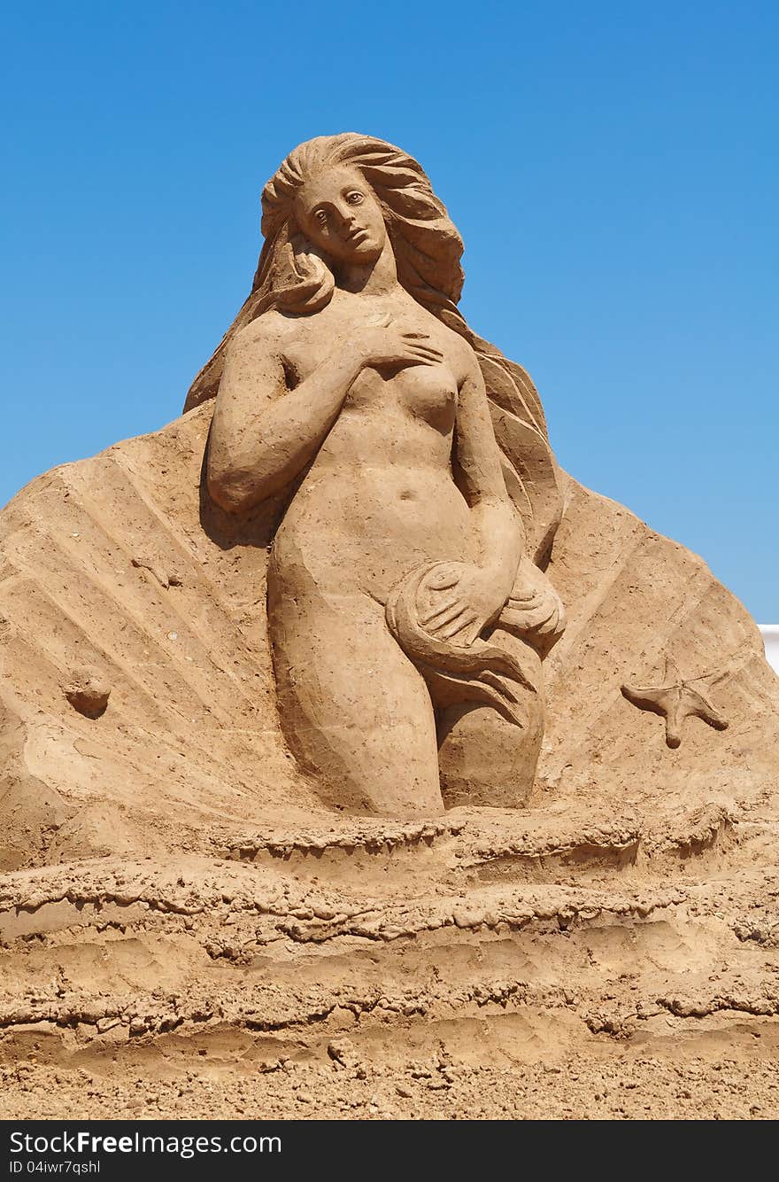 Aphrodite-a figure out of the sand.