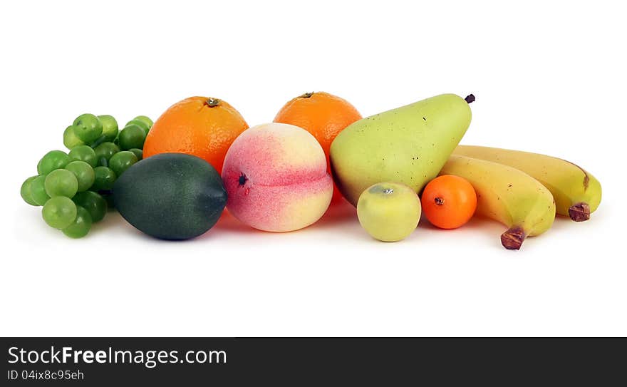 Mixed fruits: pear, peach, bananas, lemon and grape. Mixed fruits: pear, peach, bananas, lemon and grape