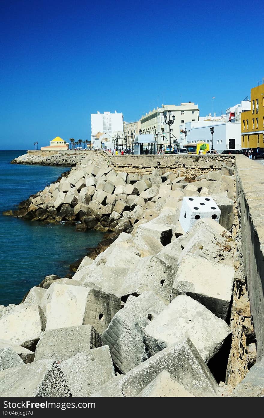 Can you find the Painted Dice hidden in the Blocks by the Harbour wall. Can you find the Painted Dice hidden in the Blocks by the Harbour wall