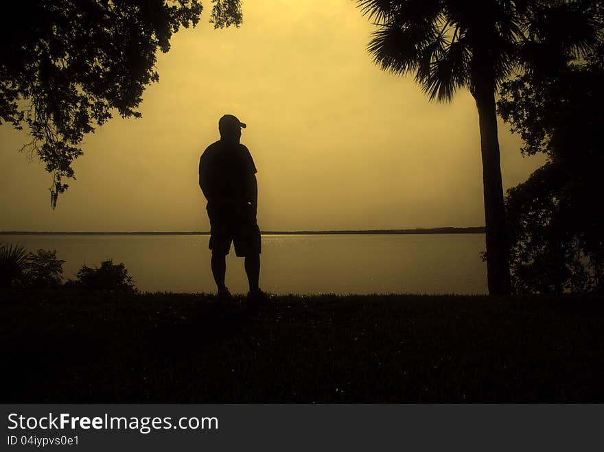 Man by the Waterfront Silhouette