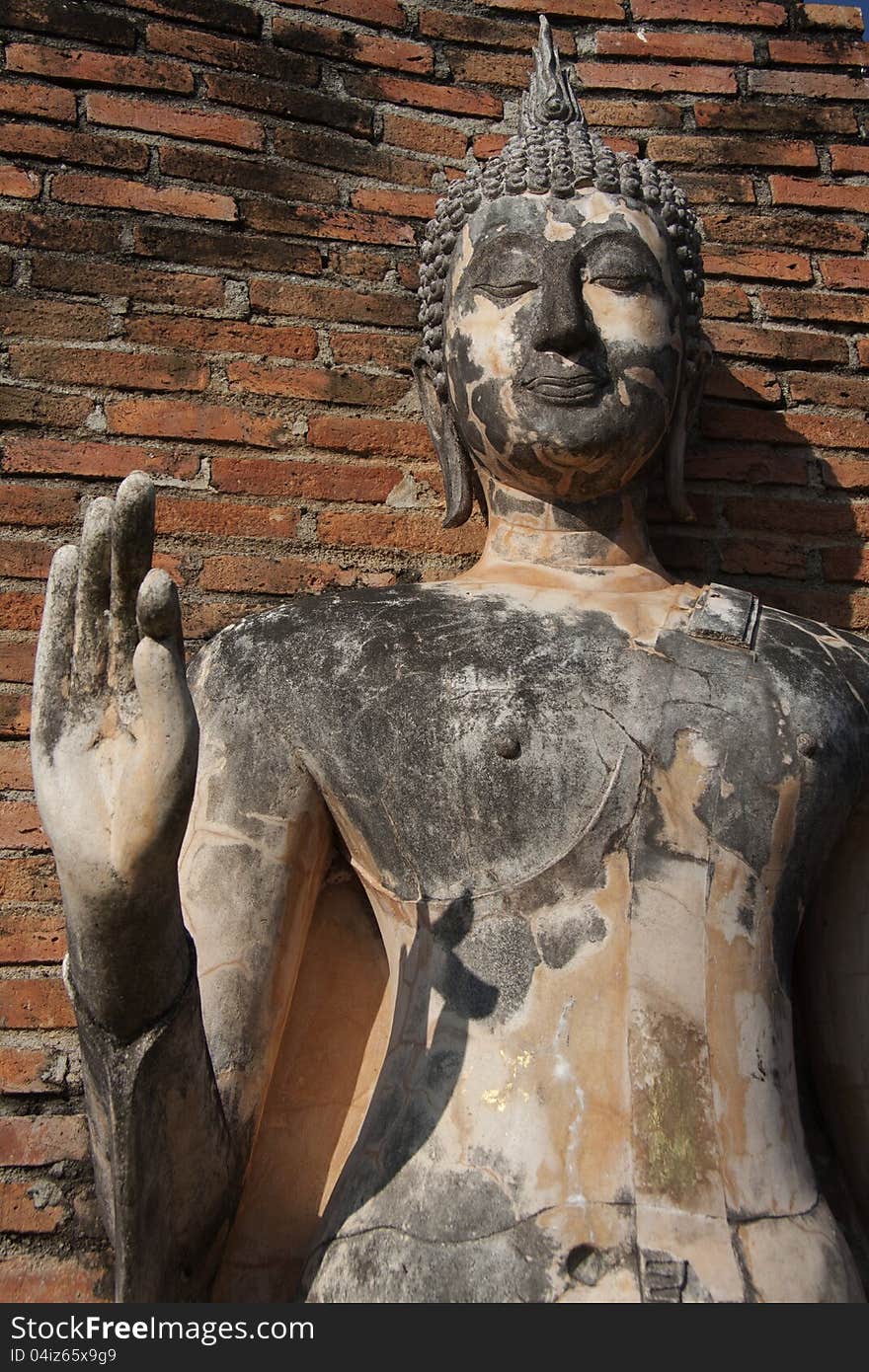 Standing Buddha statue at Sukhothai