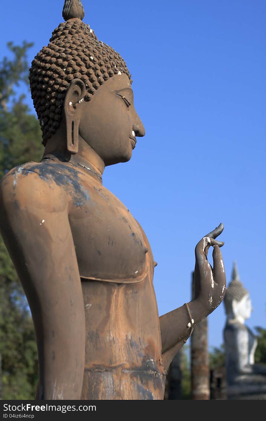 Standing Buddha statue at Sukhothai