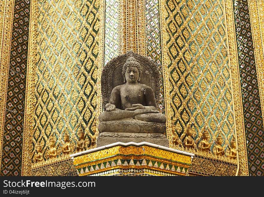 The ancient sandstone buddha statue