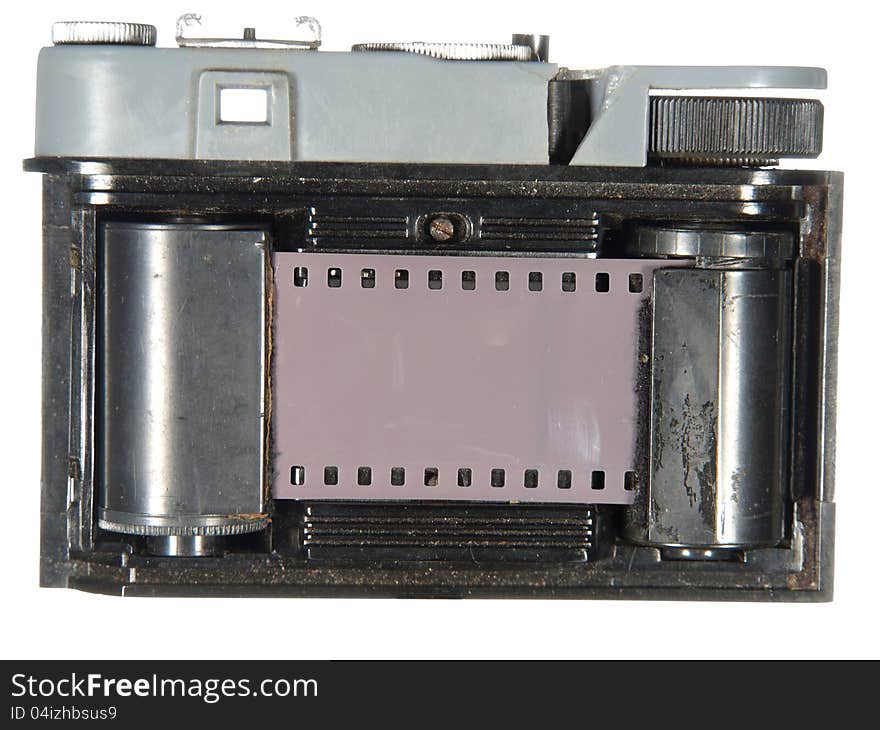 Very old classic camera, rear view, cover removed, the body is divided, isolated on white background