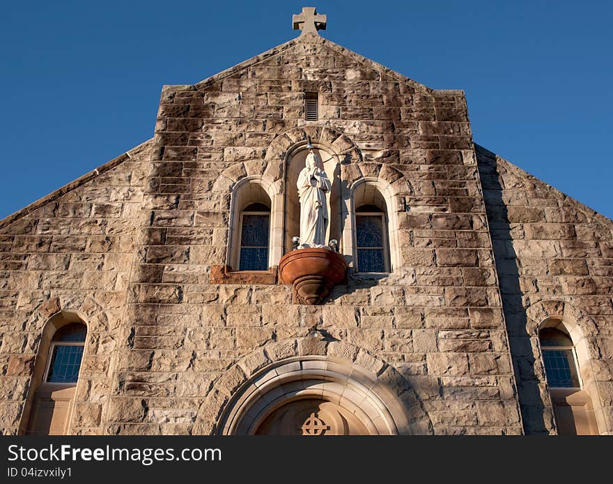 Architecture and stonework of front of catholic church. Architecture and stonework of front of catholic church