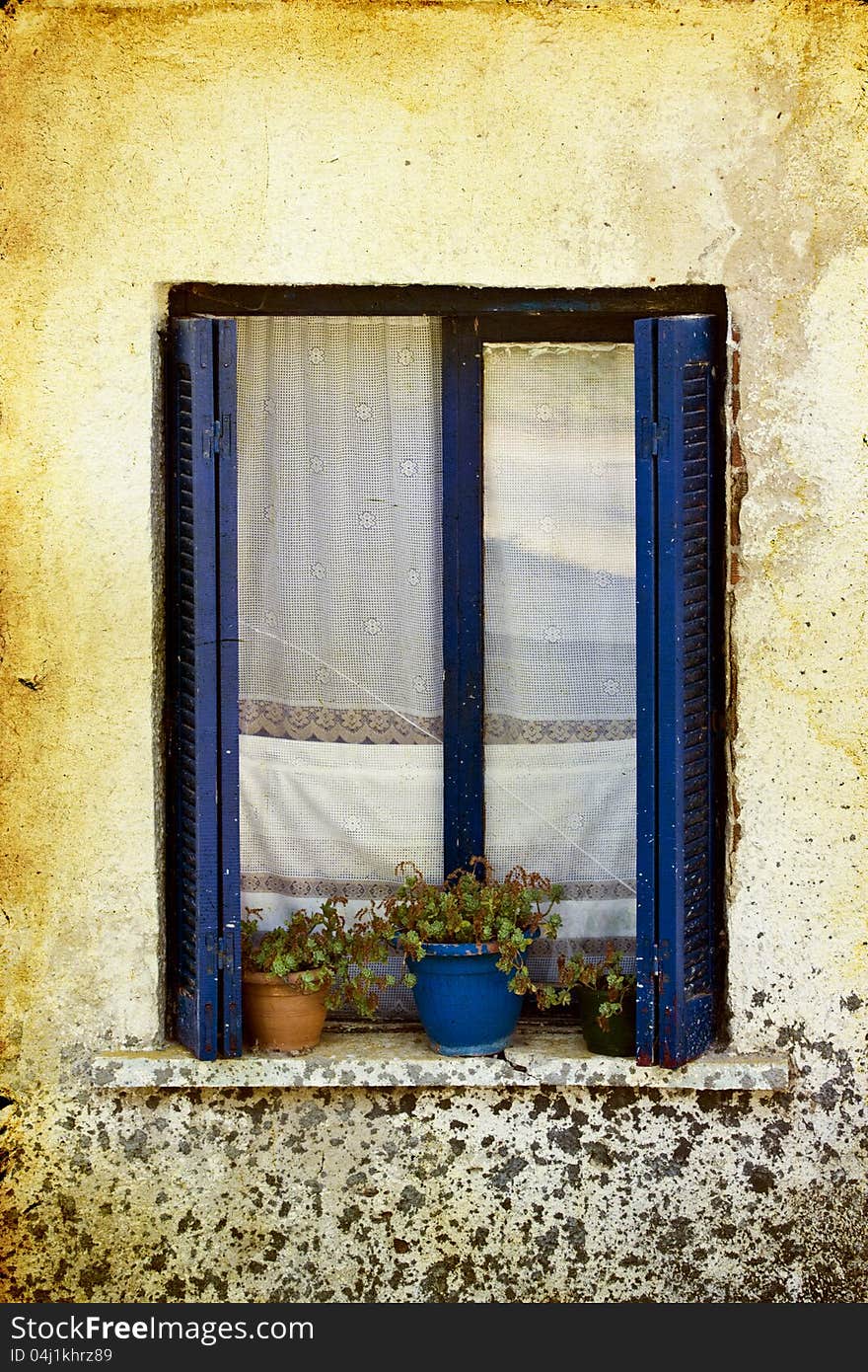 Decorative vintage window with colorful plants in pots. Decorative vintage window with colorful plants in pots