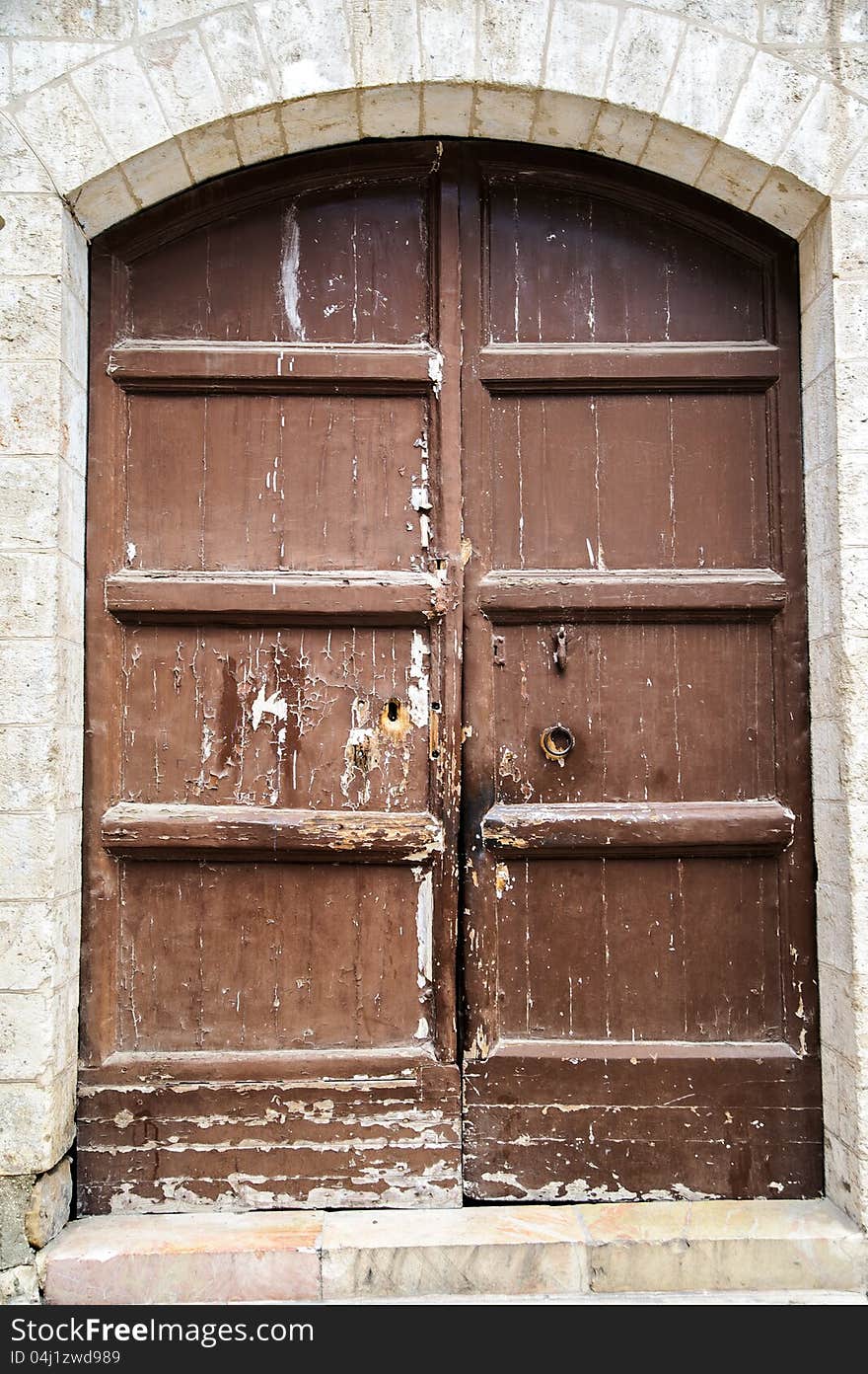 The wooden door on the old walls in Jerusalem