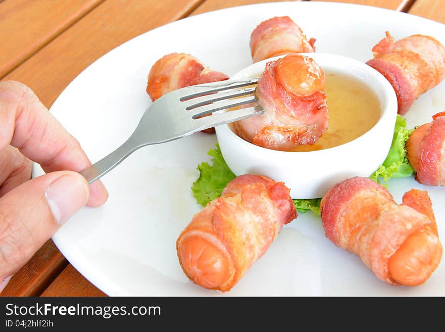 Deep Fired Sausage Wrapped With Bacon