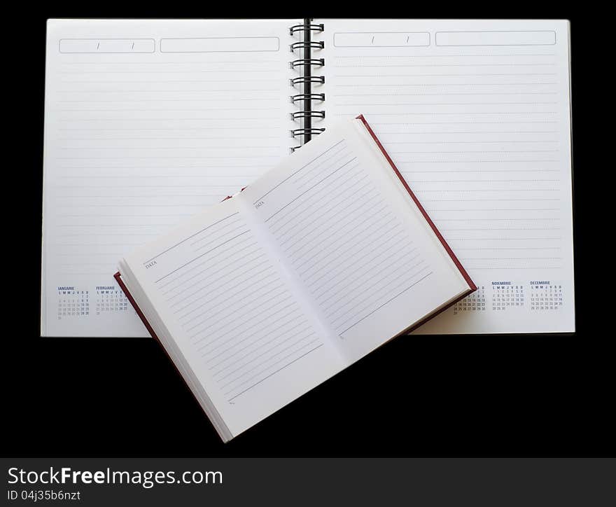 Notebooks On Black Background