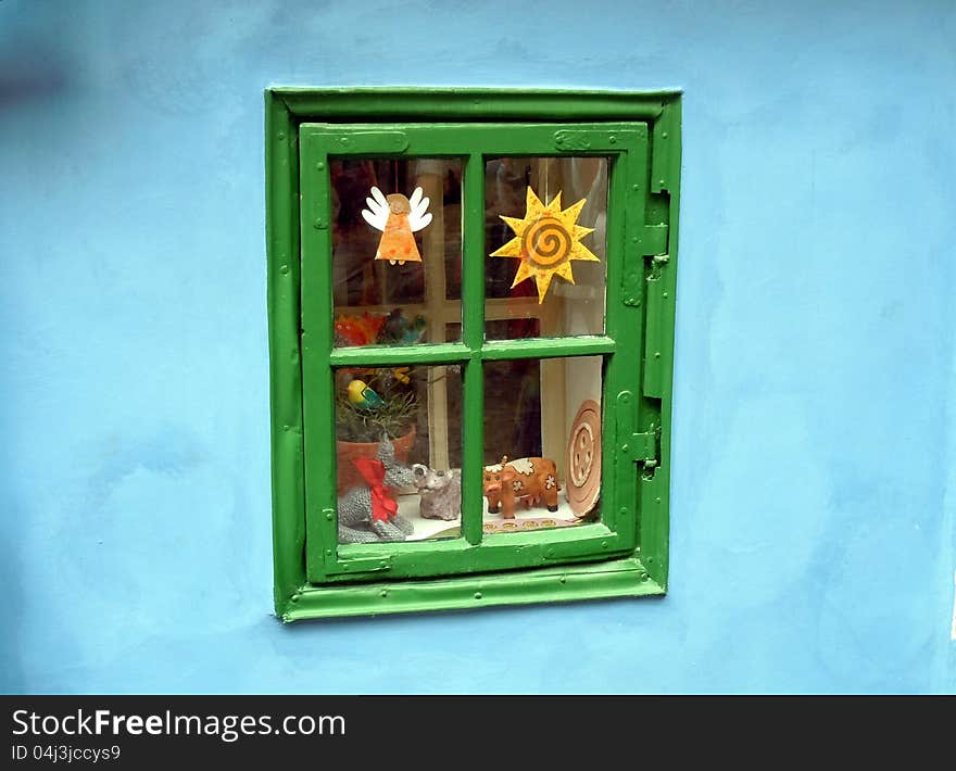 Green window with decorations