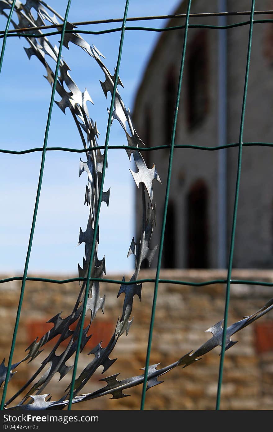 Old Soviet prison fence razor wire. Old Soviet prison fence razor wire