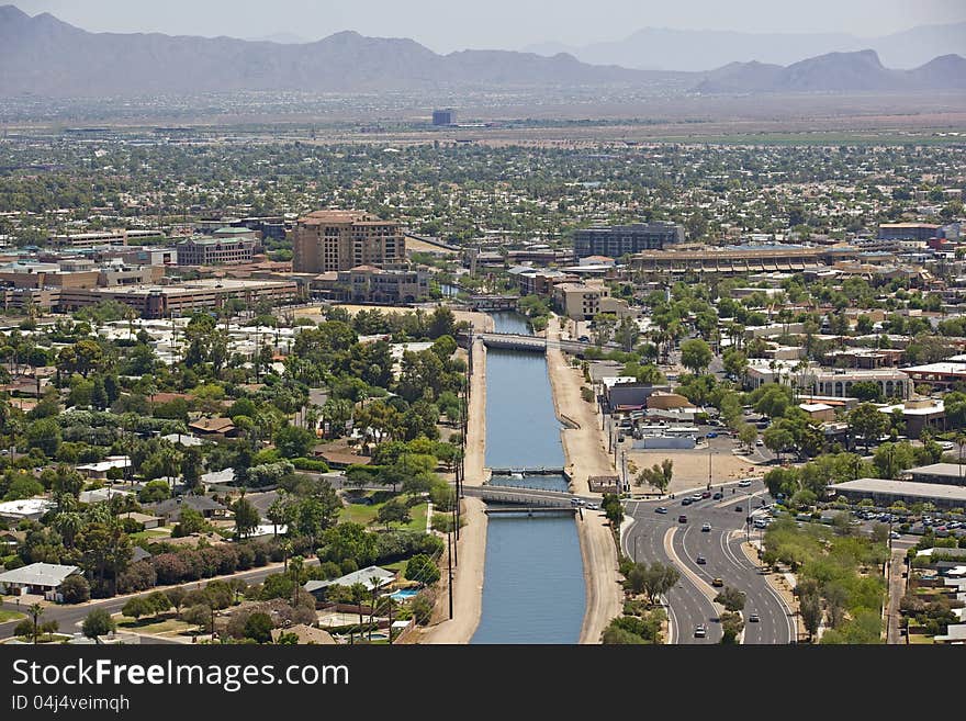 Canal running through downtown Scottsdale, Arizona from above. Canal running through downtown Scottsdale, Arizona from above