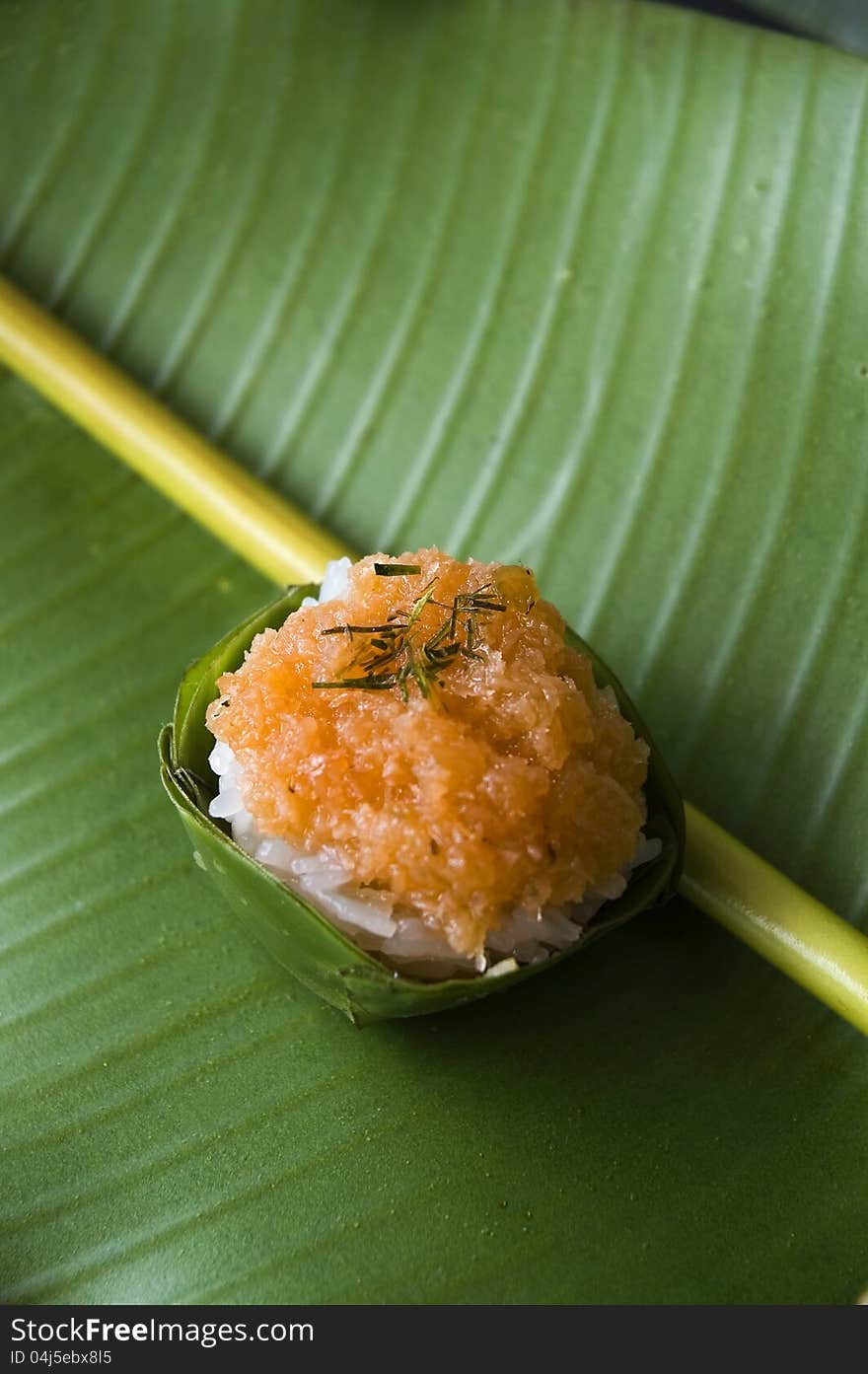 Thai dessert sweet sticky rice on green banana leaf. Thai dessert sweet sticky rice on green banana leaf