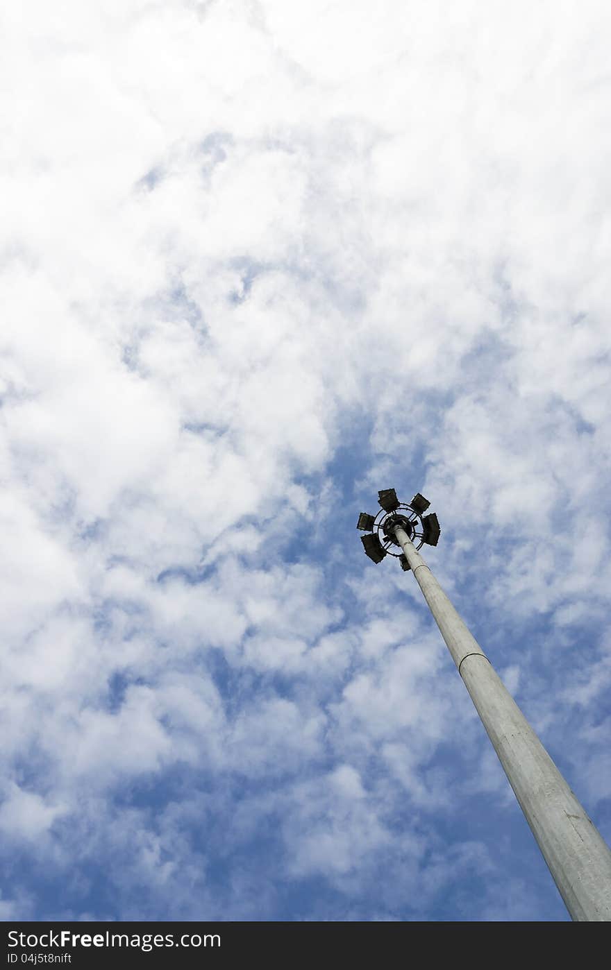 Lamp post under blue sky